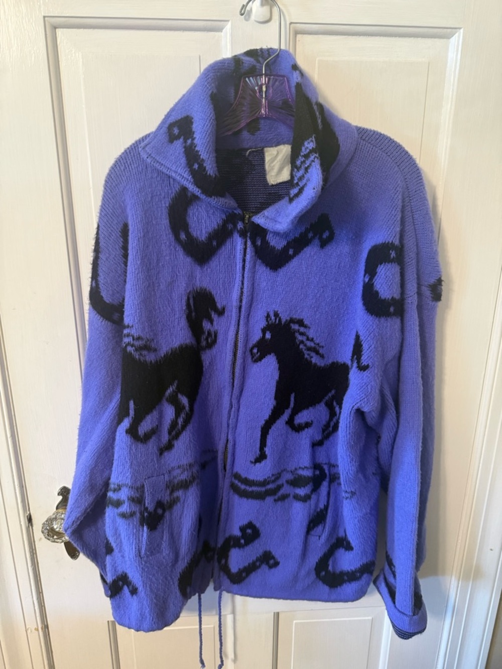 Vintage wool jacket featuring a running horse and horseshoe pattern.